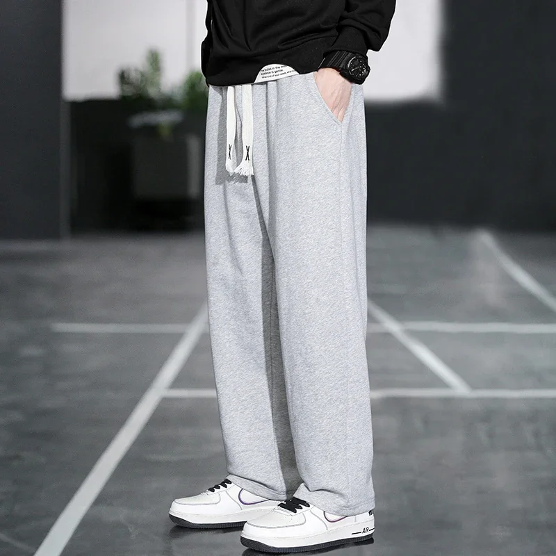 New Men's Sports Loose and Breathable Elastic Pants Outdoor Casual Running Pants Classic Solid Color Straight Leg Pants