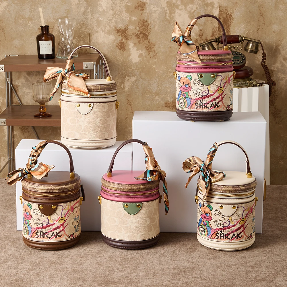 2026 New Fashionable Women's Handbag Round Bucket Bag with Niche Design High end Light Luxury Slanted Shoulder Bag