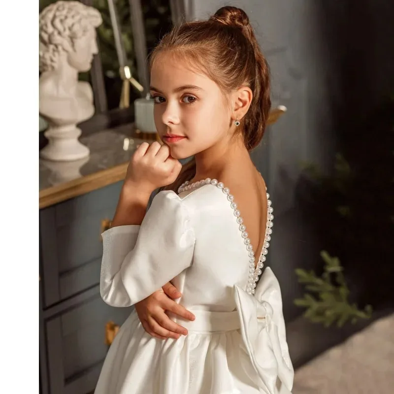Custom flower girl dress, ivory satin, pearl neckline with bow, long sleeves, suitable for weddings, communion dresses, and birt