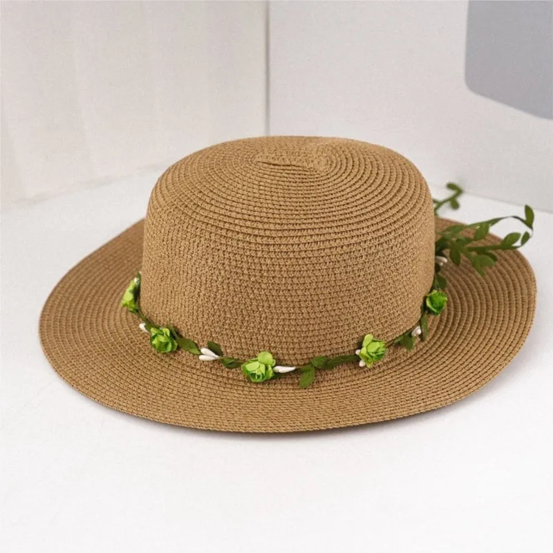 A straw-woven flat-brimmed hat decorations for women providing shade and enhancement creating small outing atmosphere