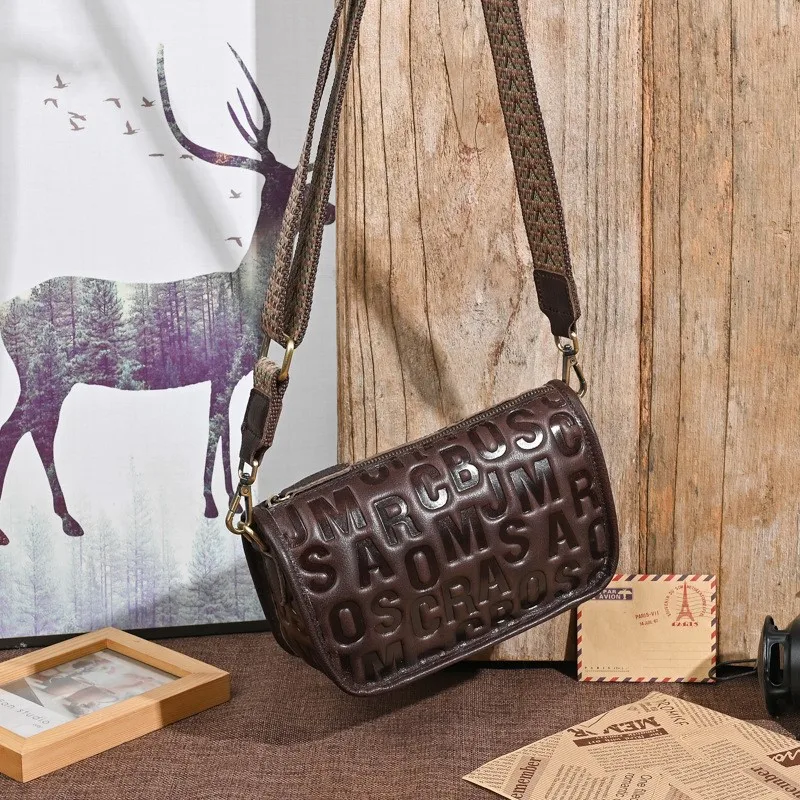 Johnature Retro Genuine Leather Letter Embossed Women's Bag 2026 New Versatile Wide Shoulder Strap Shoulder Crossbody Bag