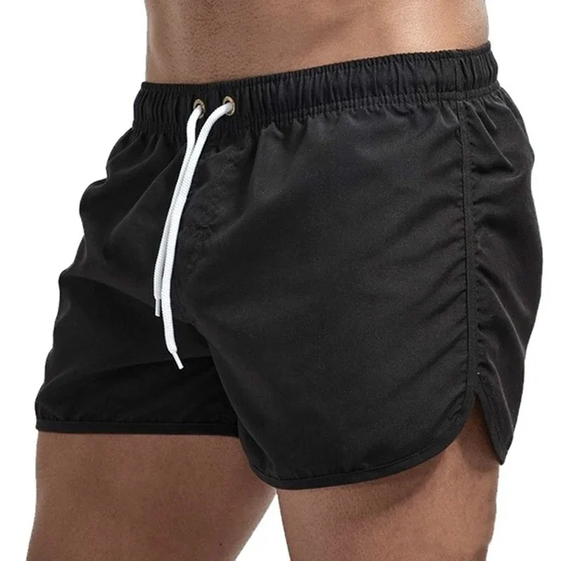 Hot Sales Mens Beach Shorts Summer Solid Color Quick Drying Man Swimwear Shorts Casual Quality Sweatpants Surf Swimming Shorts