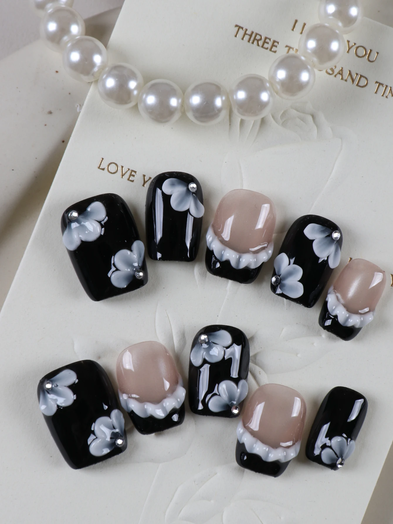 10Pcs Press on Nails  short black White petals nail art Fake Nails Includes 1 Sheet Adhesive Tabs & 1 Pc Mini File
