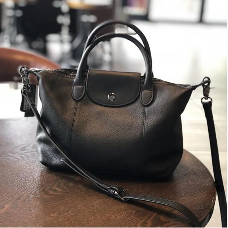 New 2025 Women Head Genuine Leather Shoulder Messenger Clutch Simple Style Luxury Dumpling Purses And Handbags