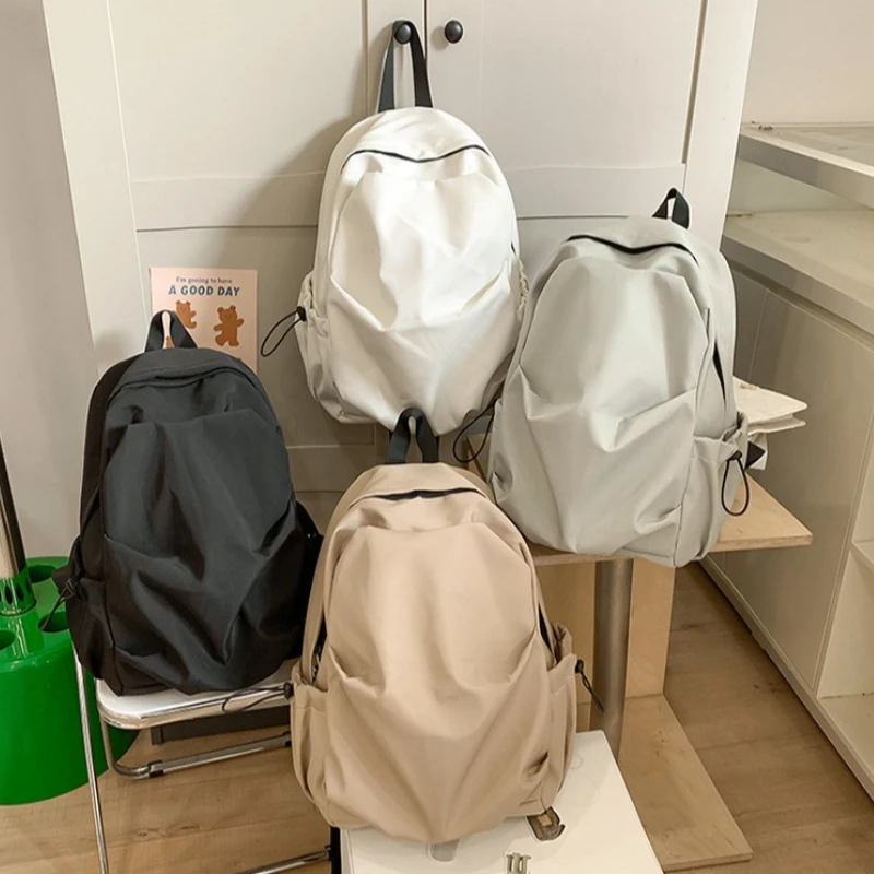 2026 New Solid Color Pleated Backpack Men's Casual Backpack Women's Travel Bag Junior High School High School Student Schoolbag